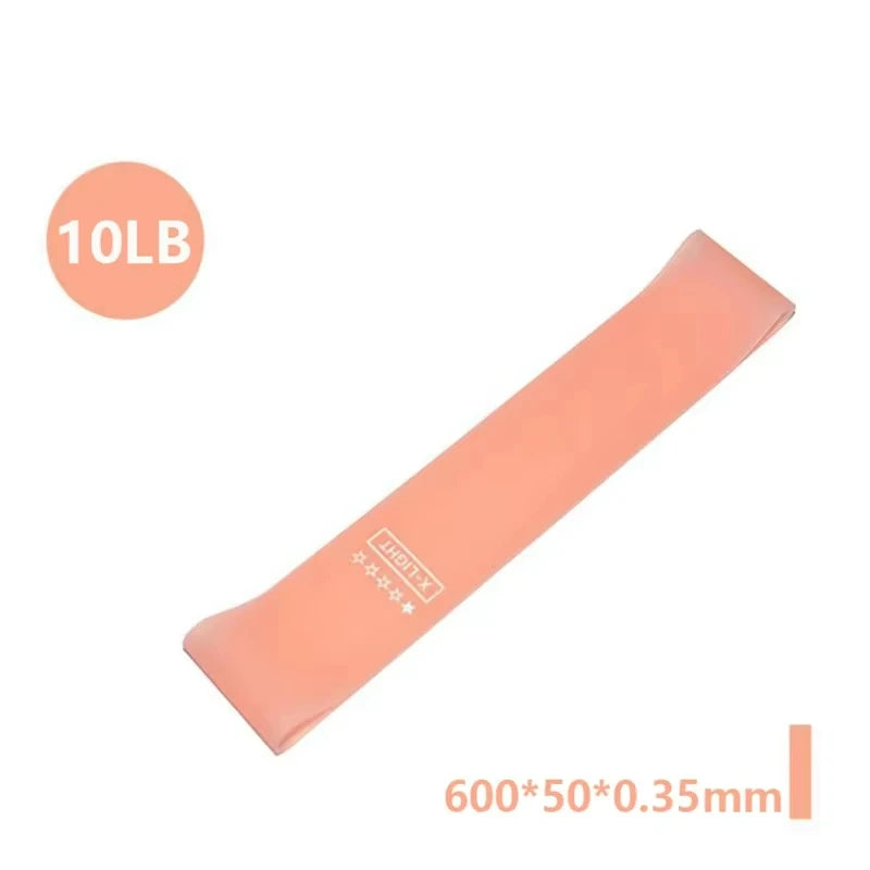 Five resistance bands in varying colors of pink, purple, and blue, labeled with resistance levels and sizes, with a carry bag.
