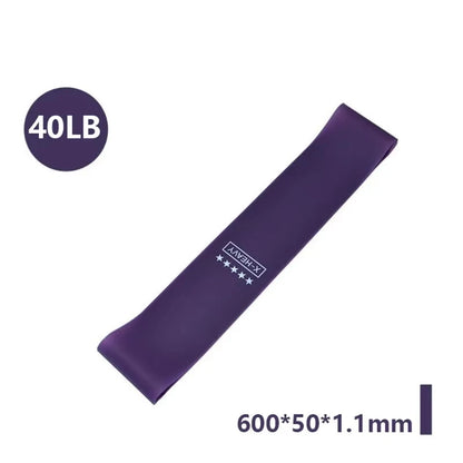 Five resistance bands in varying colors of pink, purple, and blue, labeled with resistance levels and sizes, with a carry bag.